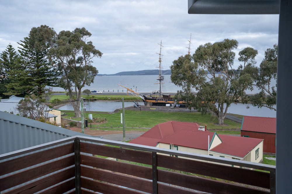 The view of the brig Amity from the balcony of the Lockyer apartment.