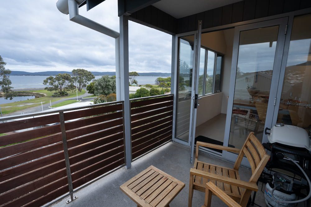 The balcony, barbeque and view of the harbour from the Lockyer apartment.